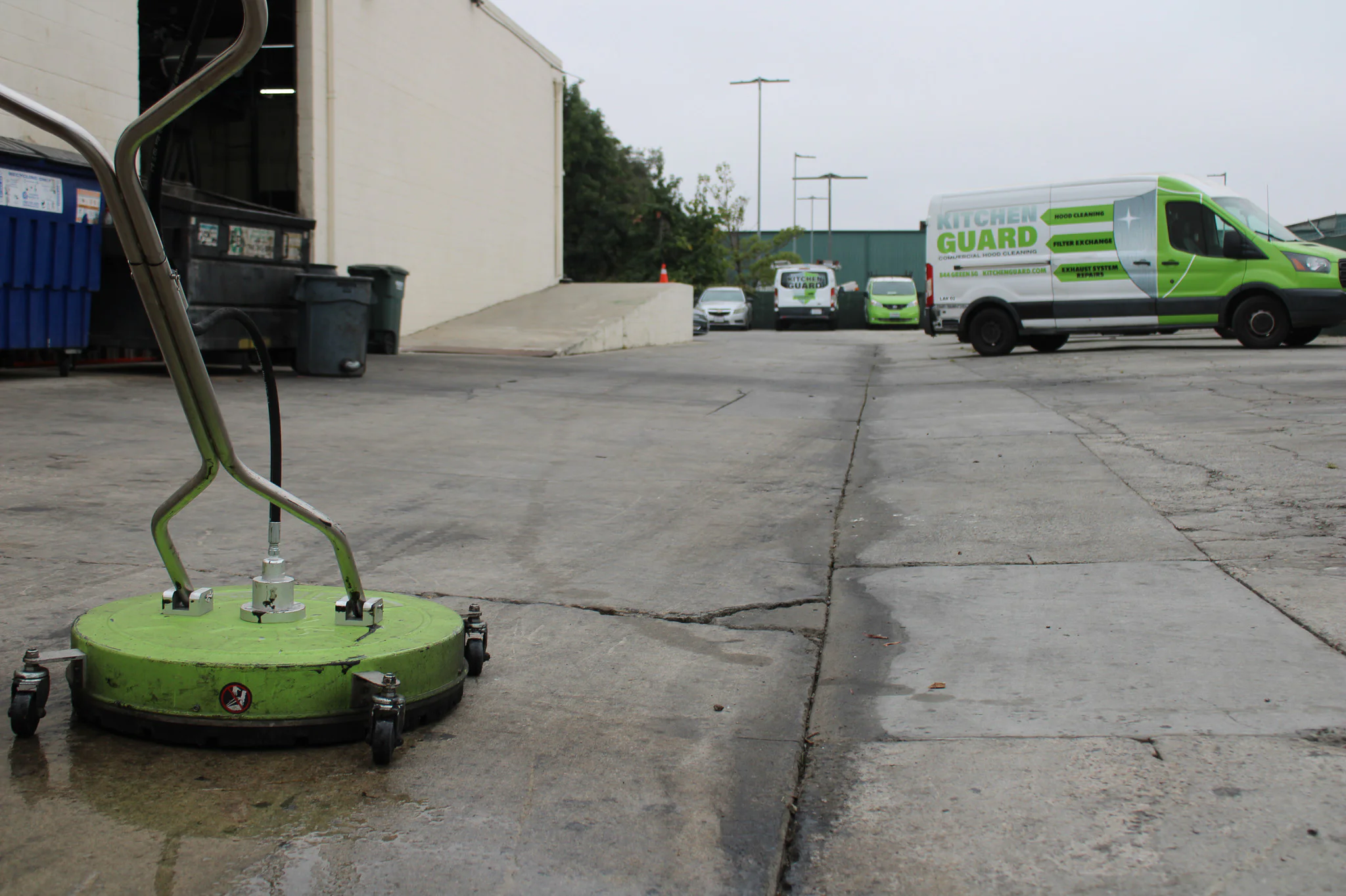 Kitchen Guard technician performing commercial pressure washing service