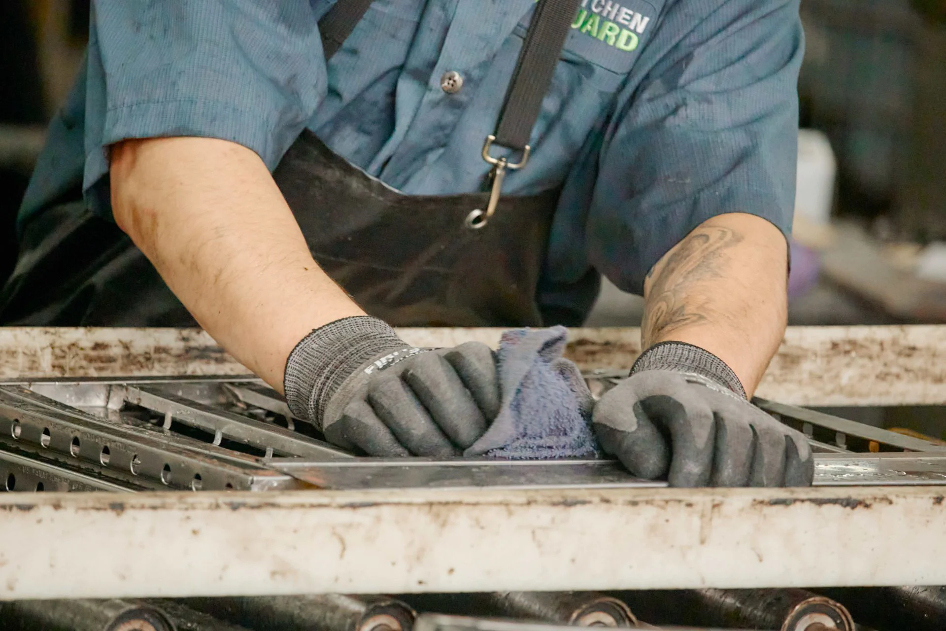 Kitchen Guard technician performing certified hood cleaning in Troy, MI