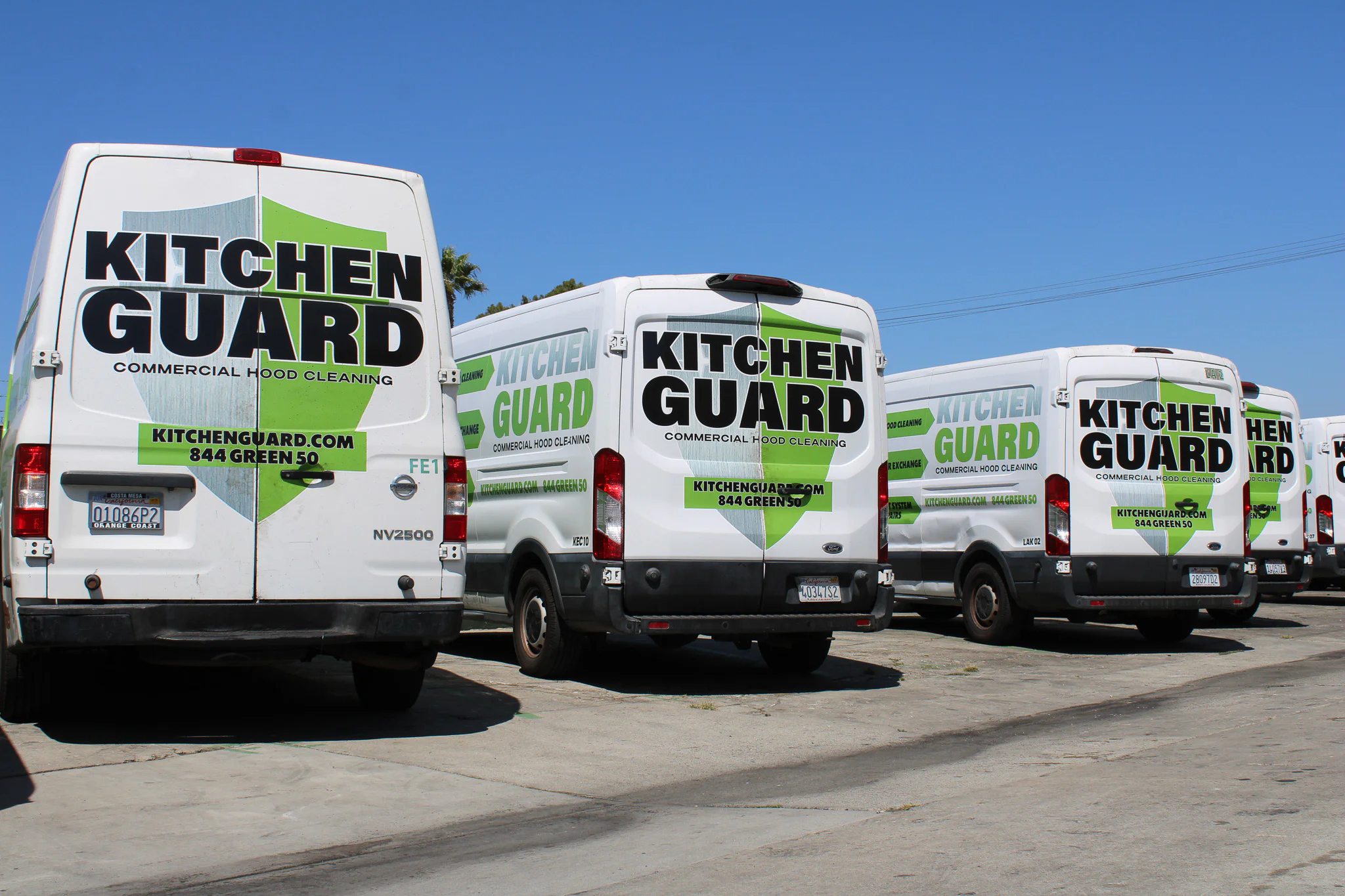 Fleet of Kitchen Guard commercial hood cleaning vans